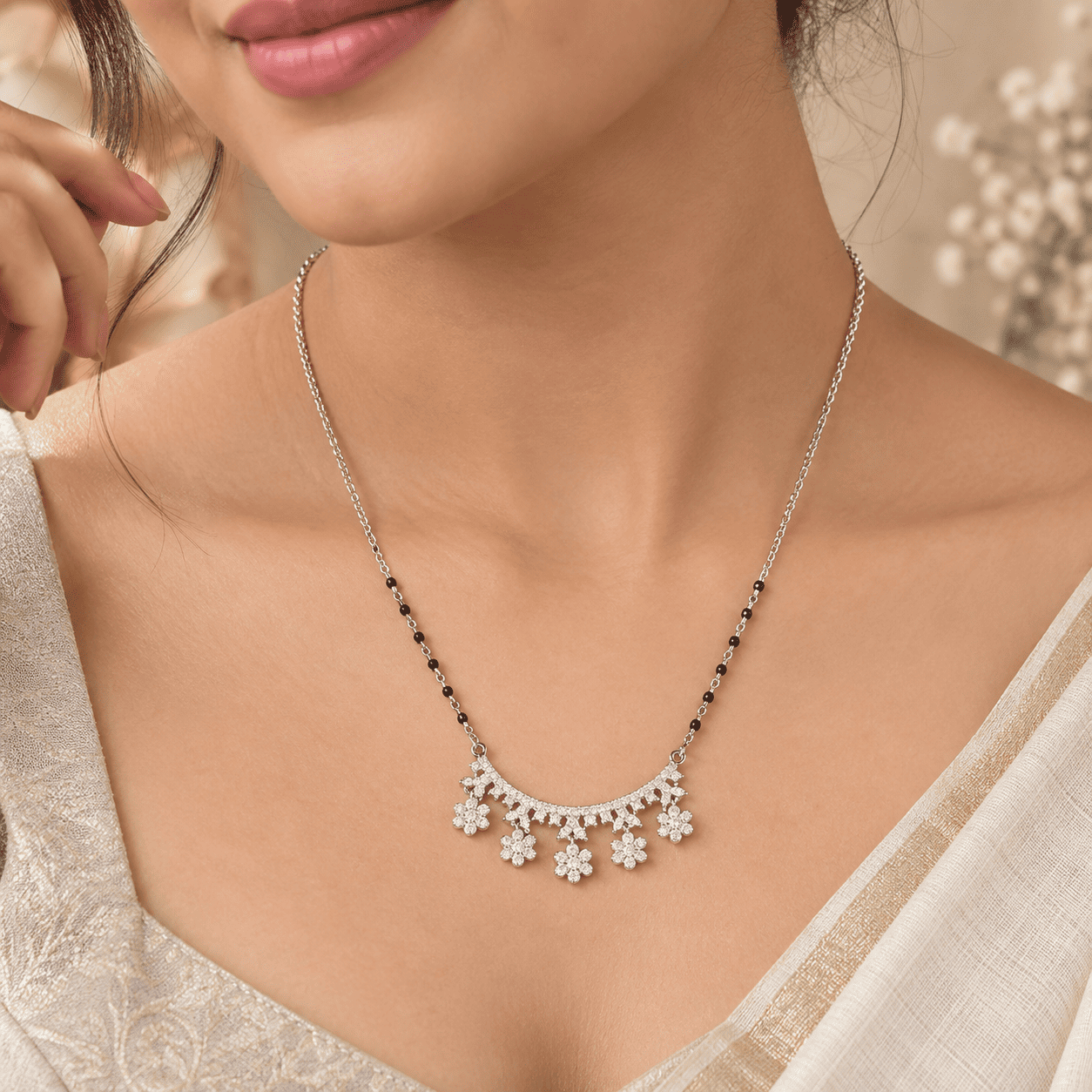 Silver mangalsutra with eartops